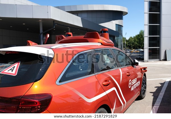 Self-driving car system from SBER AUTOTECH\
undergoing testing in Moscow  - July, 2022. The vehicle is equipped\
with numerous LiDAR sensors.High definition LiDAR for self driving\
car sensor.