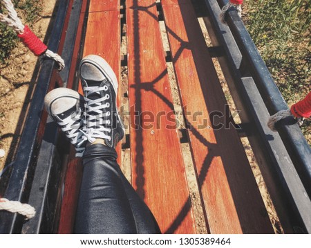 Selfie of black sneakers on suspension bridge lifestyle so cool