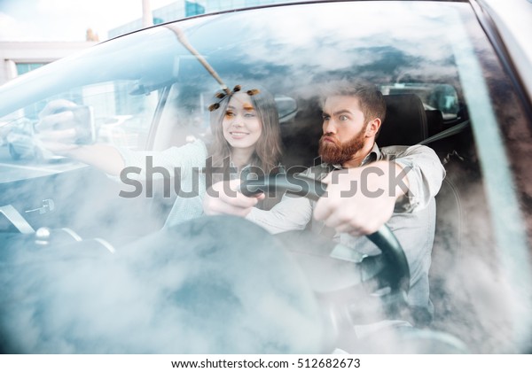 Selfie couple in car. so\
funny