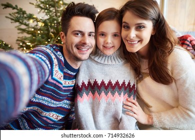 Selfie Of Family Celebrating Christmas 