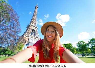 Selfie girl in Paris, France. Young tourist woman taking self portrait with Eiffel Tower in Paris. - Shutterstock ID 2167061949