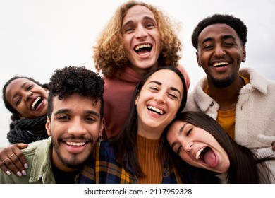 Selfie Of Group Of Young Cheerful People Looking At The Camera Outdoors. Happy Smiling Friends Hugging. Concept Of Community And Youth Lifestyle