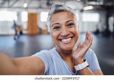 Selfie, gym and fitness senior woman taking picture after exercise, workout or training with a smile. Elderly, old and portrait of a fit female happy for wellness, health and update social media - Powered by Shutterstock