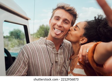 Selfie, kiss and couple taking a picture on a road trip, having fun on a traveling adventure together. Love, nature and black woman kissing man for photo, bond in romantic moment in the countryside - Powered by Shutterstock