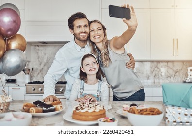 Selfie, parents or girl in celebration of a happy birthday in house party or kitchen with popcorn or cake. Mother, father or child bonding with love or care in family home take pictures to celebrate - Powered by Shutterstock