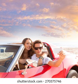 Selfie Photo Of Young Teen Couple In Convertible Sports Car