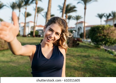 Selfie Portrait Of Active Joyful Sportswoman Smiling In Park Of Tropical City. Sunny Morning, Cheerful Mood, Motivation, Workout, Healthy Lifestyle, Fitness, Attractive Model, Happiness