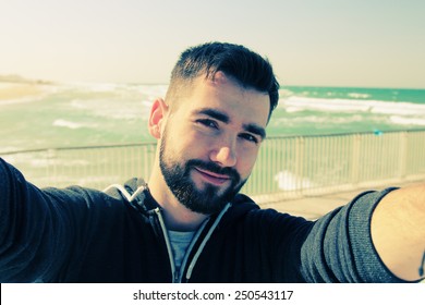 Selfie Portrait Of Young Man Outdoors