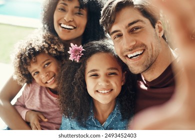 Selfie, smile and parents with kids for outdoor fun, love and interracial family in backyard at home. Mom, dad and children in garden together for bonding with digital photography, support or memory - Powered by Shutterstock