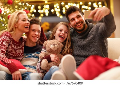 Selfie With Smiling Family On Christmas Holiday
