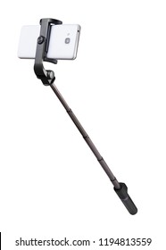 Selfie stick monopod and cellphone isolated on white with clipping path