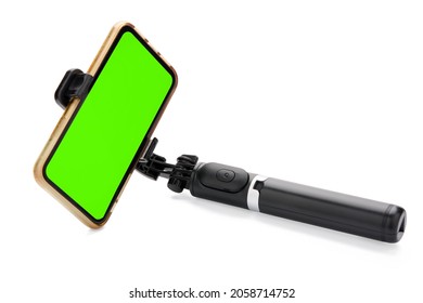 Selfie stick with smart phone isolated on white background. clipping path 