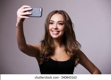 Selfie Time. Joyful Young Women Making Selfie By Her Smart Phone 