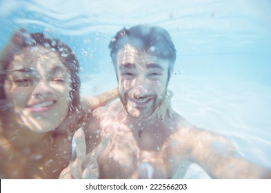 Selfie Underwater. Happy Friends Taking A Self Portrait Under The Water