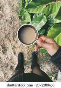 Selfie Of Woman Holding Coffee On Hand With Drinking And Boots Shoes