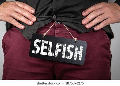 Selfish. Psychology, character traits and behavior. Man with a chalkboard. - Shutterstock ID 1875896275