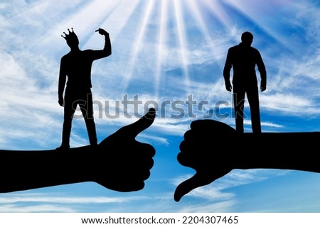 Selfishness and ego. An arrogant selfish man with a crown on his head points his finger at himself, considering himself better than other person. Concept of egoism, arrogance. Silhouette