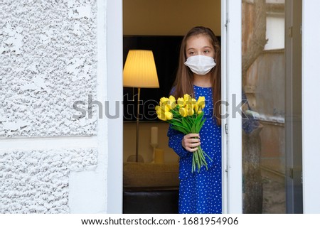 Self-isolated young girl looking out