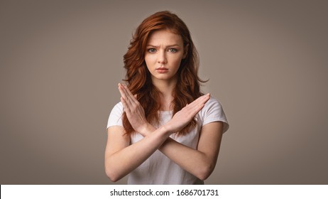Self-Isolation. Determined Girl Gesturing No Crossing Hands Forbidding Something Posing Over Gray Background. Studio Shot, Panorama - Shutterstock ID 1686701731