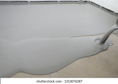 Self-leveling epoxy. Leveling with a mixture of cement floors