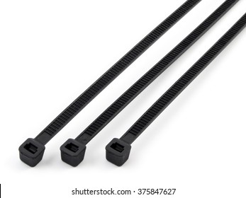 self-locked plastic zip cable ties black over white background.