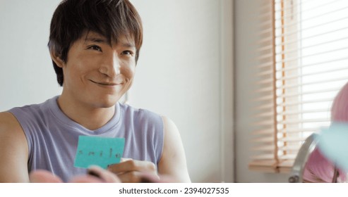 Self-love self-worth as young Gen Z LGBT gay queer non-binary men self pep talk at home. Asia people man adult guy happy relax enjoy pride month LGBTQIA youth culture. Open society LGBTQ rights. - Powered by Shutterstock