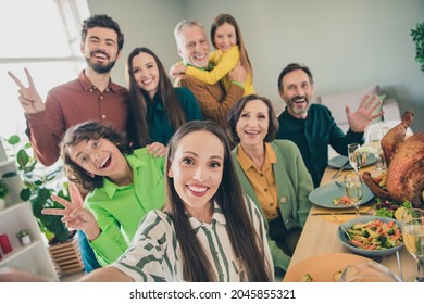 Self-portrait Of Attractive Cheerful Big Full Family Meeting Showing V-sign Good Mood Having Fun At Home Indoors