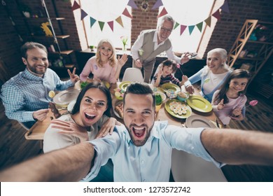 Self-portrait Selfie Of Cheerful Excited Glad Ecstatic Family Small Little Brother Sister Son Daughter Festive Event Party Joy Showing V-sign Peace Victory Morning Day In Loft Industrial Interior