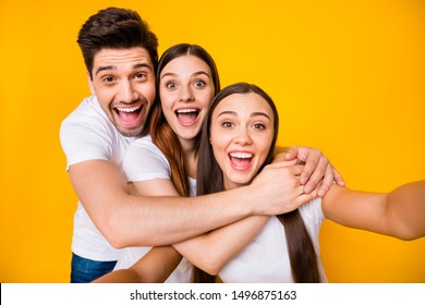 Self-portrait of three nice attractive lovely cheerful cheery positive playful person buddy fellow having fun free time isolated over bright vivid shine yellow background - Shutterstock ID 1496875163