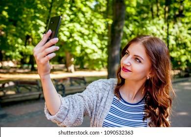 Self-time. Portrait of selfie addict happy young woman. - Shutterstock ID 1090532363