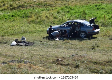 Selim Pass, Armenia - August 1, 2019: Armenian Family With Car By The Campfire