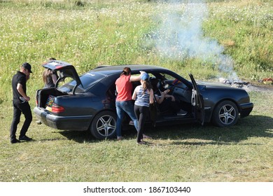 Selim Pass, Armenia - August 1, 2019: Armenian Family With Car By The Campfire