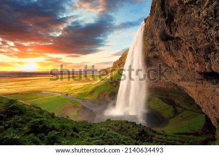 Seljalandsfoss is one of the most beautiful waterfalls on the Iceland. It is located on the South of the island. With a rainbow.