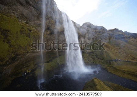 Seljalandsfoss Waterfall in Southern Iceland, on the river Seljalandsá with its origins underneath the glacier Eyjafjallajökull Stock photo © 