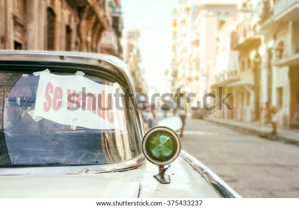 sell old white car in\
Havana - Cuba