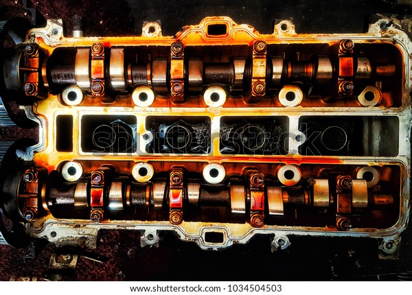 Sellective focus. The top of the\
cylinder head with two engine camshafts with fully timing\
belt