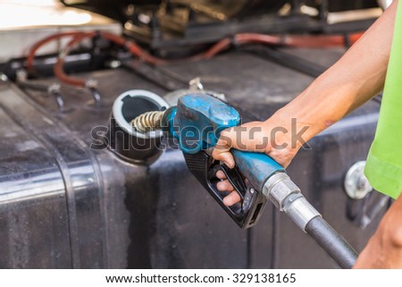 Seller refill oil for a car.small business of fuel pump and  old equipment
