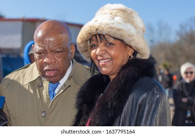 Selma, Alabama, USA - March 03, 2013: Representative John Lewis and a friend after reenacting the march across the Edmund Pettus Bridge