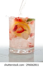 Seltzer Drink With Fresh Cut Fruit Floating Inside