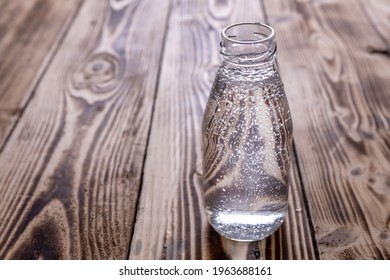 Seltzer Water Bottle On Wooden Background