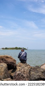 Semarang, 11 November 2022 People Fishing On The Marina Beach