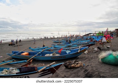 Semarang, Indonesia (11-11-2022): A View Of A Row Of Small Fishing Boats On The Beach