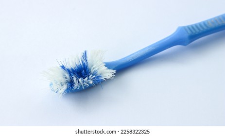 Semarang, Indonesia 5 Feb 2023 - Damaged toothbrush bristles isolated on white background.