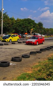 Semarang Indonesia August 17 2019 Red Mitsubishi Lancer Race With Honda Jazz Driving Fast On Local Drag Strip Blurry In Motion