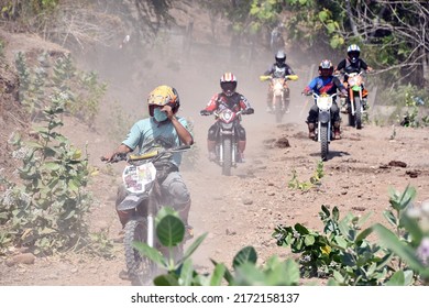 Semarang, Indonesia - October 13, 2019 : Motocross Racer Is Driving On A Barren Road