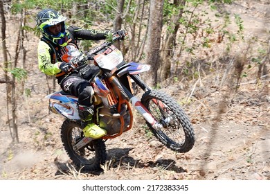 Semarang, Indonesia - October 13, 2019 : A Motocross Rider Freestyle Climbing A Hill