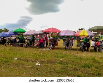 Semarang,indonesia-02 October 2022:a Row Of Motorized Traders Lined Up In A Field At Noon When There Was A People's Party In A Village