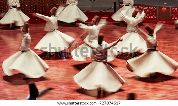 Semazen or Whirling Dervishes,\
Konya. Sufi whirling dervish (Semazen) dances at . Semazen conveys\
God\'s spiritual gift to those are witnessing the\
ritual.