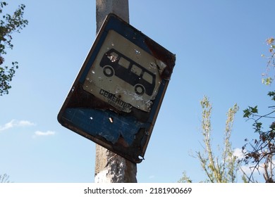 Semenivka, Ukraine - September 05 2014: Road Sign Of A Bus Stop Next To Hospital Pierced By Bullets During The Russian Ukrainian War