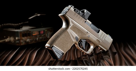 Semi Automatic Pistol And Cb Radio On A Bronze And Wavy Background